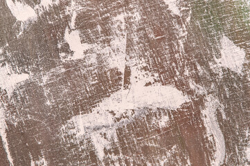 abstract colorful creative background - rough linen canvas unevenly covered with multi-colored primers, reflections of light. Toning, blur. Temporary object.