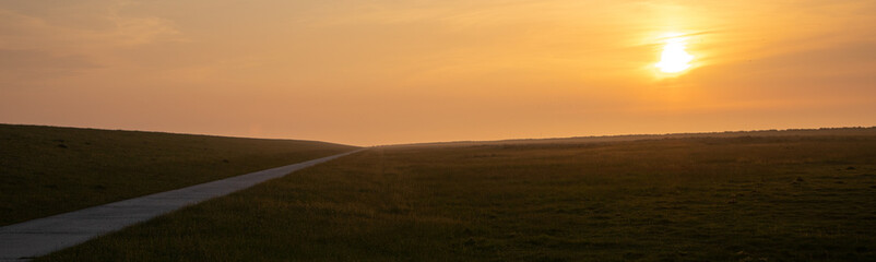 Naklejka na ściany i meble sunrise over the fields - landscape background