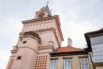 Fototapeta na wymiar Gothic Castle Brandys nad Labem, Renaissance palace view from garden, clock tower, chateau park, sgraffito mural decorated plaster at facade, wall decor, Central Bohemian, Czech Republic