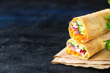shaurama doner kebab pita bread filling vegetables organic dish on the table healthy food meal...