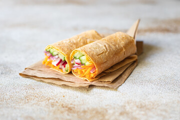 shaurama doner kebab pita bread filling vegetables organic dish on the table healthy food meal...