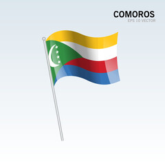 Comoros waving flag isolated on gray background