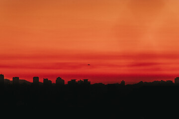 city skyline airplane plane