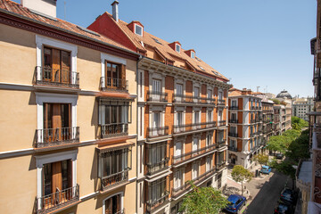 Fototapeta premium Facades of buildings with viewpoints and balconies with cast iron railings in the center of Madrid