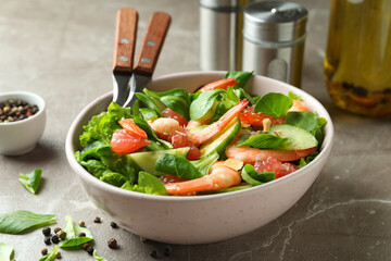 Concept of tasty eating with shrimp salad, close up