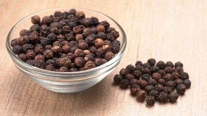 Group of Organic Black pepper isolated on white background. Selective focus and Top view (Flat Lay)