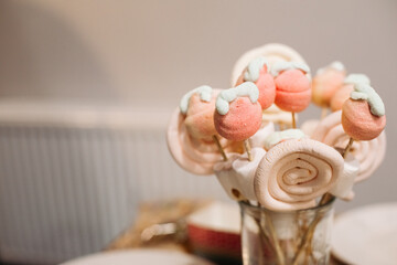 picture of a lot of yummy marshmallows on sticks different shapes and colours