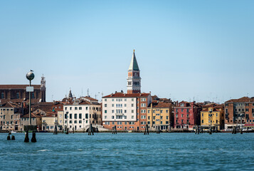 Fototapeta na wymiar Urban Skyline of Venice with the Bell Tower of San Marco (Campanile), and the Basilica and Cathedral (St. Mark the evangelist), seen from the lagoon, UNESCO world heritage site, Veneto, Italy, Europe.