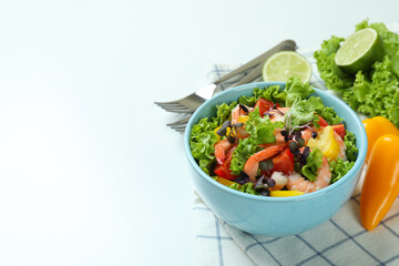 Concept of tasty eating with shrimp salad on white background