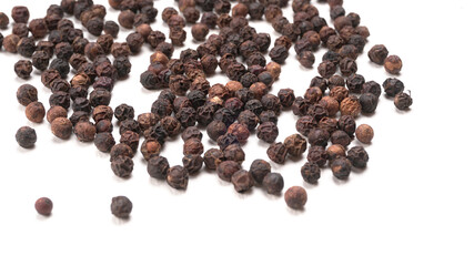 Group of Organic Black pepper isolated on white background. Selective focus and Top view (Flat Lay)