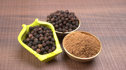Group of Organic Black pepper isolated on white background. Selective focus and Top view (Flat Lay)