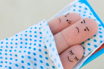 Fingers art of  family sleep together. Concept of child prevents parents from sleeping.