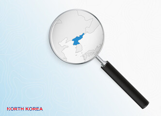 Magnifier with map of North Korea on abstract topographic background.