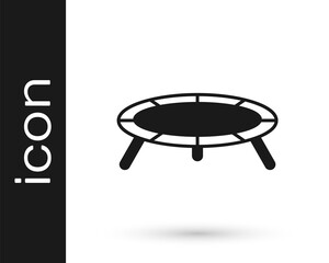 Black Jumping trampoline icon isolated on white background. Vector