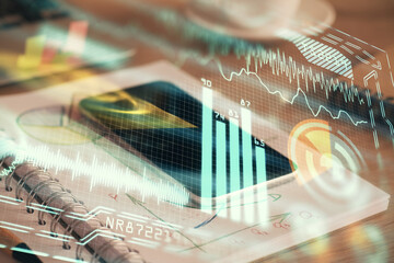 Double exposure of tech theme sketch over cell phone background. Concept of technology