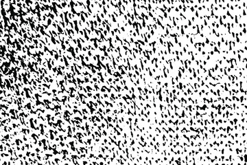 Grunge texture of knitted fabric. Monochrome mottled background of close-up knitwear with spots, halftone and graininess. Overlay template. Vector illustration