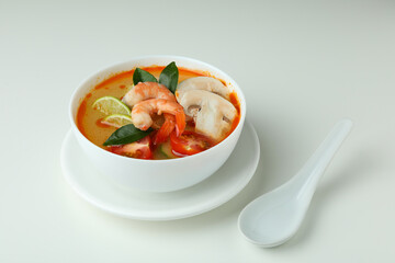 Tasty Tom yum soup on white background