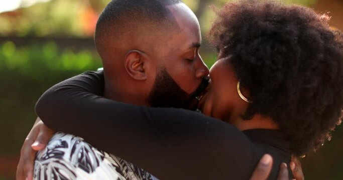 African couple in love kissing. intimate passionate kiss