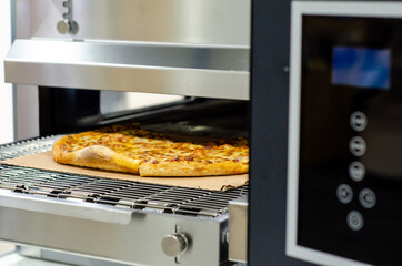 Close-up of industrial electric pizza oven