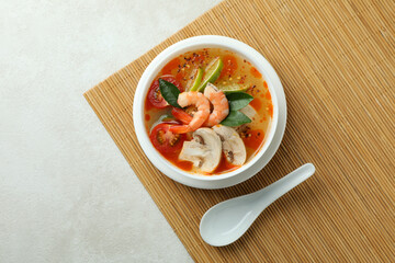 Tasty Tom yum soup on bamboo mat