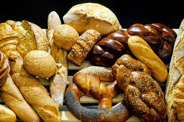 Baked goods. Butter buns, french baguette, croissant and bread.