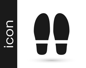 Black Footsteps icon isolated on white background. Detective is investigating. To follow in the footsteps. Vector