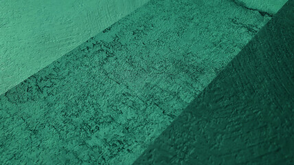 cement or concrete laminated sample in multi texture in green turquoise color tone. close up stucco...