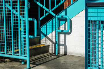 Blue stairway and brick on urban building