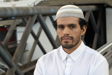 Man wearing traditional islamic skull cap