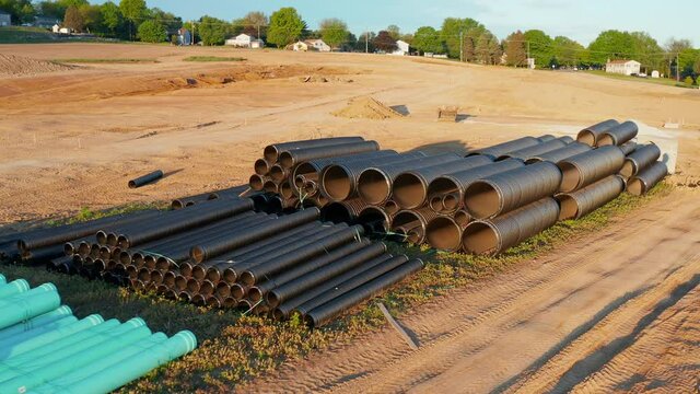 Groundwater and storm water management pipes and piping ready at excavation site. Runoff and rainwater, rain. Civil engineering design.