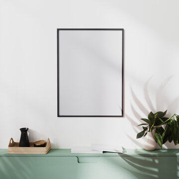 mock up poster frame on white wall with palm shadow and green cabinets with decoration, 3d illustration