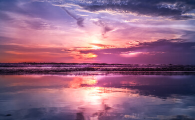 Fototapeta na wymiar Purple sunset at the beach Bali