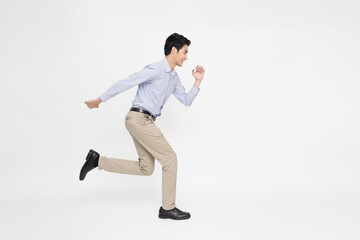 Young Asian businessman running forward isolated on white background