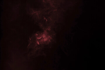 Yellow and pink steam on a black background.