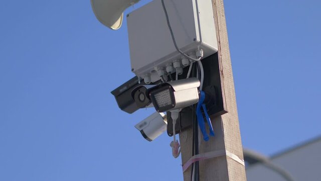 Security cameras on the pole in 4k slow motion 60fps