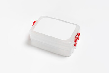 Plastic food containers with handles isolated on white background. High-resolution photo.