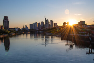 Fototapeta na wymiar Frankfurts skyline at sunset. Main River. Summer sunset