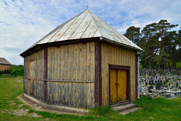 Built in 1811, a wooden Catholic church was moved in 1862 to the cemetery in Turośl in Podlasie, Poland.