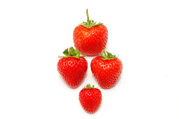 Beautiful fresh strawberries on a white background. Natural and healthy food. Dessert. Red berry with a green tail. Ripe fruit. Berries from the garden. Harvest. Strawberries. Decoration for pastry 