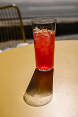 lemonade with ice on yellow table on summer terrace. refreshment summer cold drink