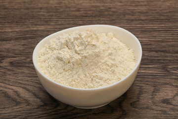 Wheat flour heap in the bowl