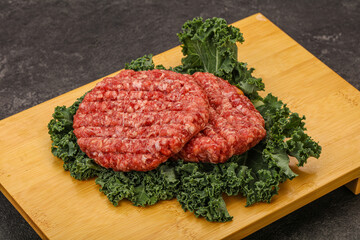 Raw beef burger cutlet for cooking
