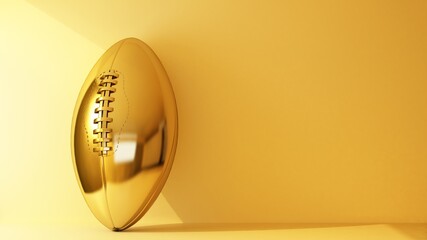 golden rugby ball on yellow background