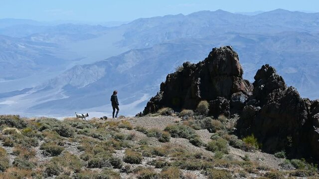 Woman looking out over Death Valley from Inyo Mountains.