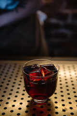 glass of sangria on bar table