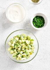 Avocado eggs salad in bowl