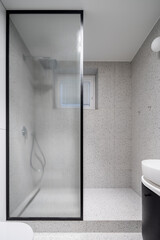 Modern bathroom with terrazzo style tiles
