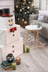 Funny snowman in living room decorated for Christmas