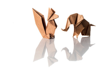 Mixed origami animals over white background. Handmade art made with colored paper.