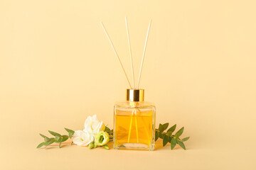 Reed diffuser with eustoma on color background